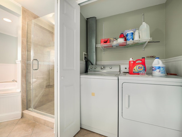 121 Bogert Ave, Pearl River, NY 10965 - washroom featuring separate washer and dryer, light tile patterned flooring, and wainscoting