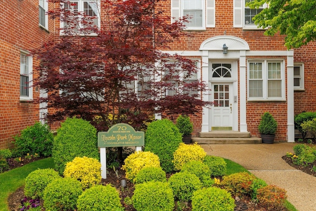 70 S Park Ave Unit 114, Rockville Centre, NY 11570 - entrance to property featuring brick siding