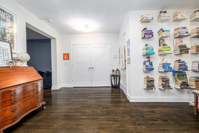 70 S Park Ave Unit 114, Rockville Centre, NY 11570 - entryway with wood finished floors and baseboards