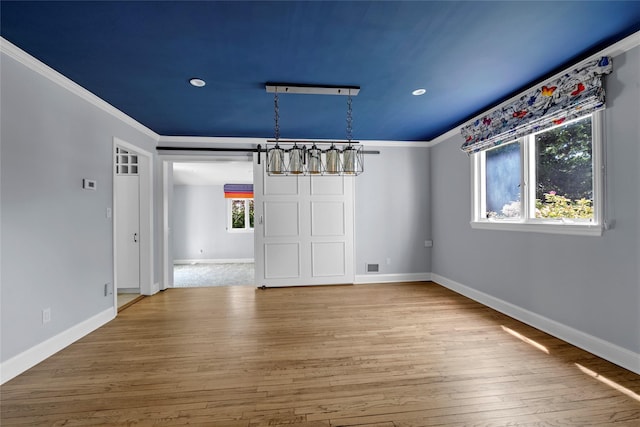 2 Driftwood Dr, Port Washington, NY 11050 - unfurnished room with wood finished floors, ornamental molding, baseboards, and recessed lighting