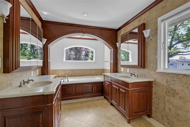 2 Driftwood Dr, Port Washington, NY 11050 - full bath featuring plenty of natural light, two vanities, a bath, and ornamental molding