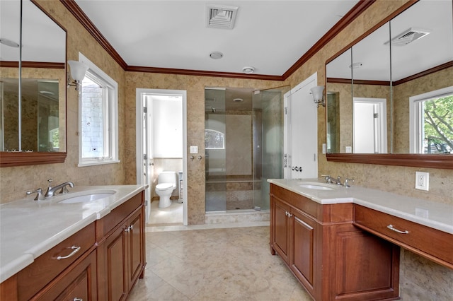 2 Driftwood Dr, Port Washington, NY 11050 - bathroom featuring ornamental molding, a shower stall, two vanities, toilet, and tile patterned floors