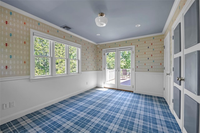 2 Driftwood Dr, Port Washington, NY 11050 - spare room featuring french doors, crown molding, wainscoting, wallpapered walls, and carpet