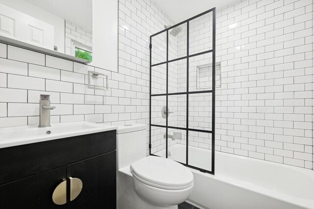 50 Christabel St, Lynbrook, NY 11563 - full bath with tile walls, vanity, shower / bathtub combination, and decorative backsplash