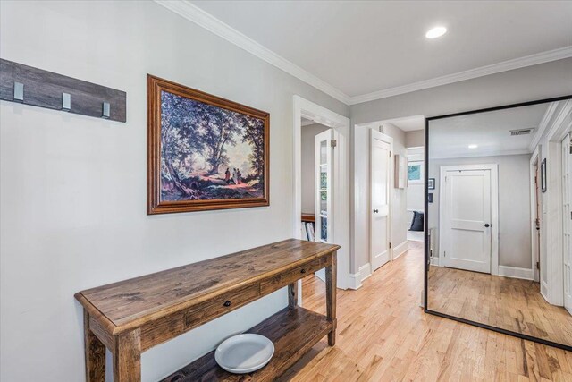 130 Sands Point Rd, Sands Point, NY 11050 - hall featuring light wood finished floors, baseboards, ornamental molding, and recessed lighting