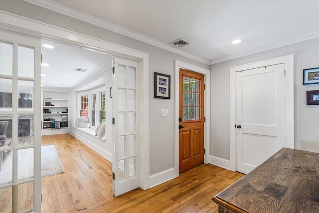 130 Sands Point Rd, Sands Point, NY 11050 - entryway featuring hardwood / wood-style flooring, healthy amount of natural light, ornamental molding, baseboards, and recessed lighting