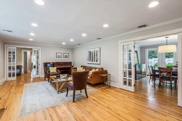 130 Sands Point Rd, Sands Point, NY 11050 - dining room featuring french doors, light wood finished floors, recessed lighting, baseboards, and ornamental molding