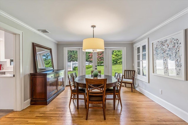 130 Sands Point Rd, Sands Point, NY 11050 - dining room with light wood-style floors, ornamental molding, french doors, and baseboards
