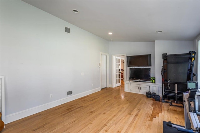 130 Sands Point Rd, Sands Point, NY 11050 - unfurnished living room with light wood-style flooring, baseboards, and recessed lighting