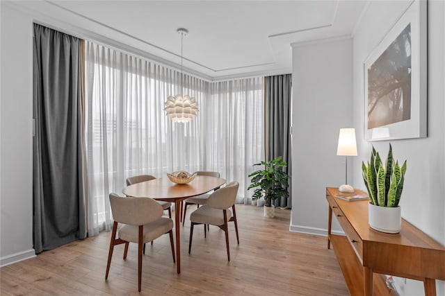 1 Renaissance Sq Unit 10H, White Plains, NY 10601 - dining room featuring light wood-style floors and baseboards