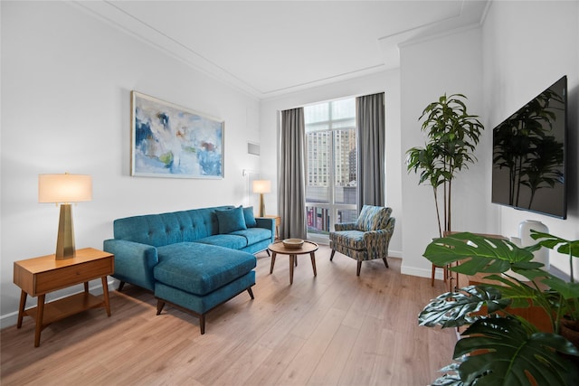 1 Renaissance Sq Unit 10B, White Plains, NY 10601 - living area with light wood finished floors, crown molding, and baseboards