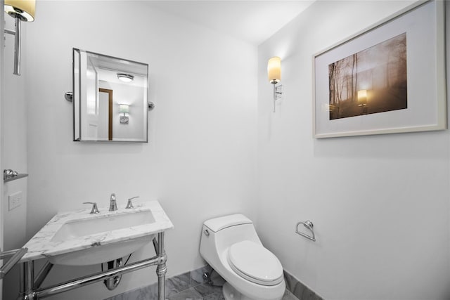 1 Renaissance Sq Unit 10B, White Plains, NY 10601 - half bath featuring marble look tile flooring and toilet
