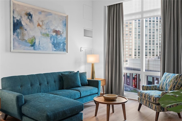 1 Renaissance Sq Unit 10B, White Plains, NY 10601 - living area with healthy amount of natural light and wood finished floors