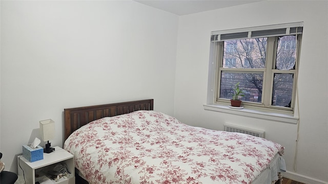 44-69 Kissena Blvd Unit 2P, Flushing, NY 11355 - bedroom featuring wood finished floors and a wall unit AC
