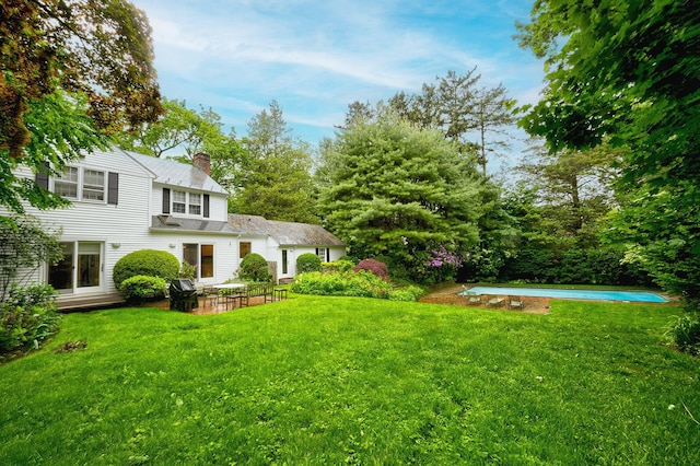24 Cedar Ln, Sands Point, NY 11050 - view of green lawn featuring a patio area