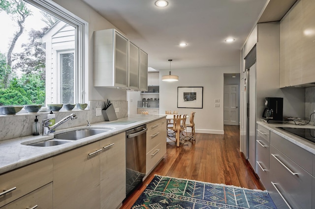 24 Cedar Ln, Sands Point, NY 11050 - kitchen featuring dishwasher, a sink, dark wood finished floors, modern cabinets, and glass insert cabinets