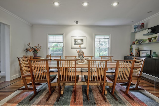 24 Cedar Ln, Sands Point, NY 11050 - dining area featuring wood finished floors, plenty of natural light, crown molding, and baseboards