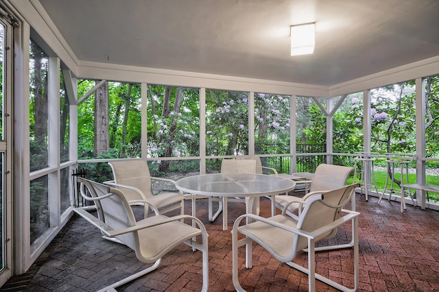 24 Cedar Ln, Sands Point, NY 11050 - sunroom with outdoor dining area