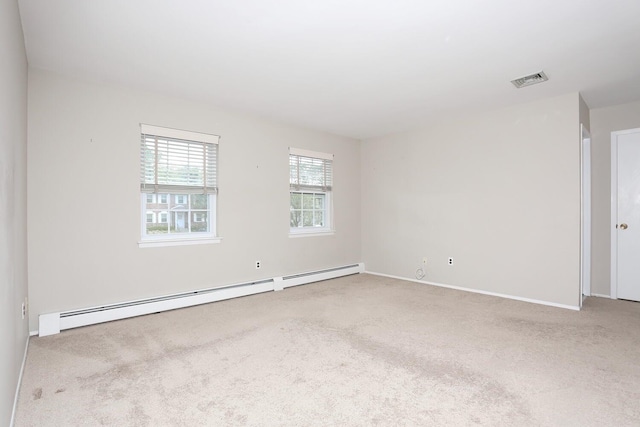 503 Jumano Ct, Suffern, NY 10901 - spare room with carpet, a baseboard heating unit, and baseboards