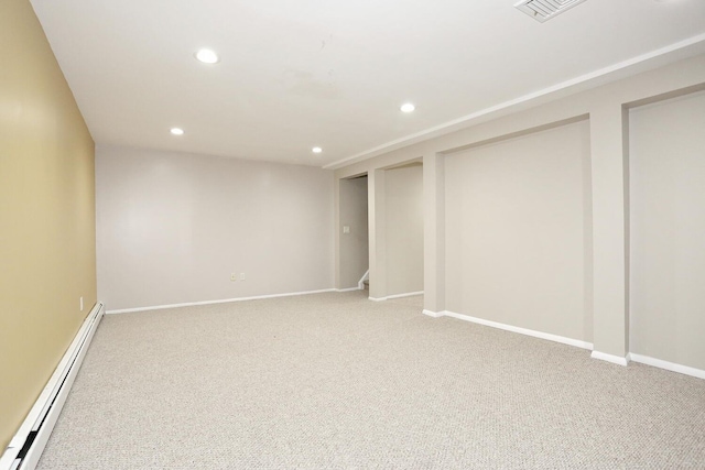 503 Jumano Ct, Suffern, NY 10901 - finished basement with a baseboard heating unit, recessed lighting, carpet, and baseboards
