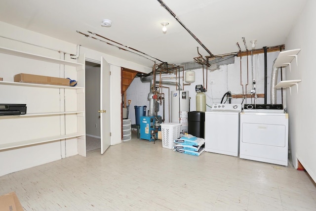 503 Jumano Ct, Suffern, NY 10901 - basement featuring independent washer and dryer, gas water heater, and tile patterned floors