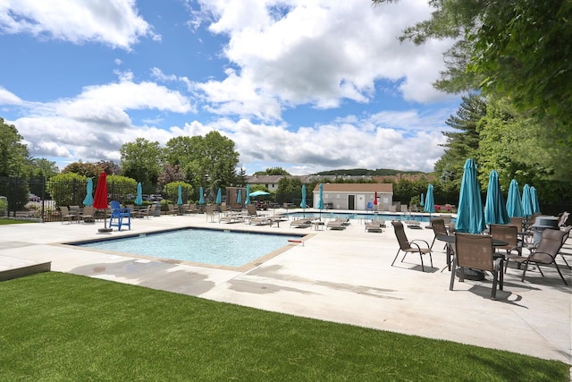 503 Jumano Ct, Suffern, NY 10901 - community pool featuring a patio area