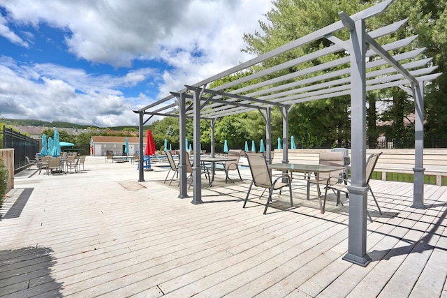 503 Jumano Ct, Suffern, NY 10901 - wooden terrace featuring outdoor dining space and a pergola
