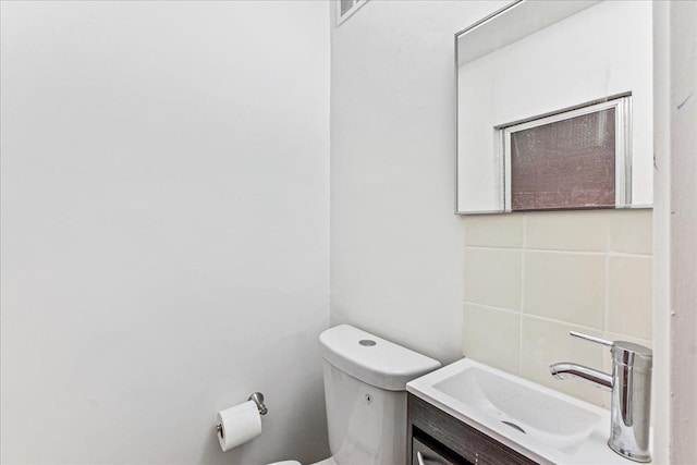 1049 E 219th St, Bronx, NY 10469 - half bath featuring toilet and vanity
