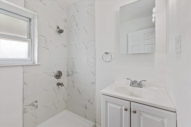 1049 E 219th St, Bronx, NY 10469 - bathroom featuring a tile shower and vanity
