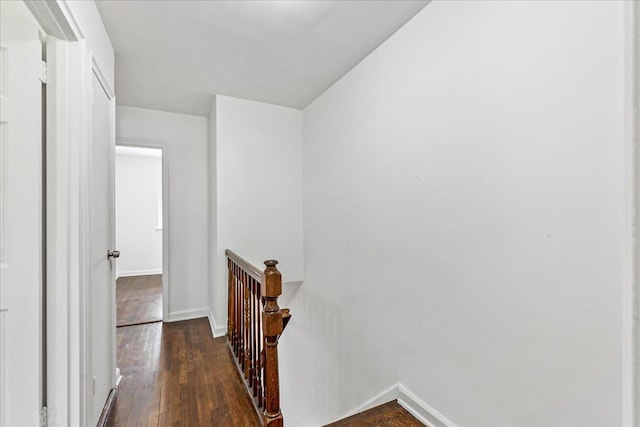 1049 E 219th St, Bronx, NY 10469 - hall featuring an upstairs landing, hardwood / wood-style floors, and baseboards