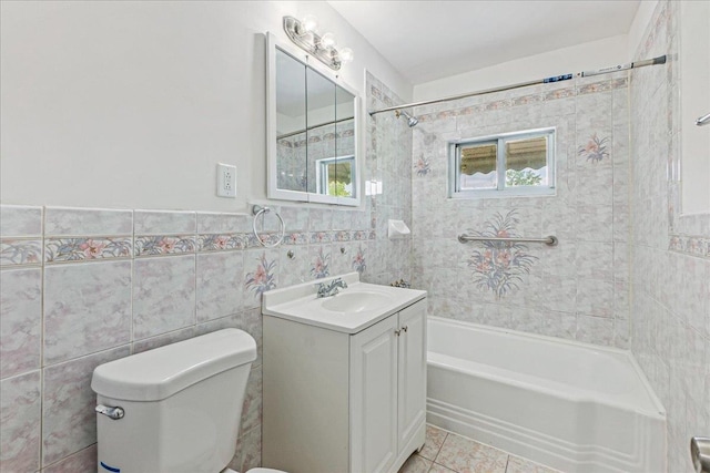 1049 E 219th St, Bronx, NY 10469 - bathroom with vanity, toilet, tile walls, shower / tub combination, and plenty of natural light