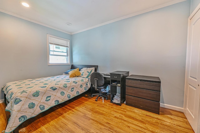 37 E Locust St, Central Islip, NY 11722 - bedroom with wood finished floors, ornamental molding, recessed lighting, and baseboards