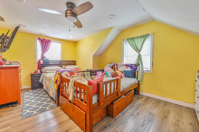 37 E Locust St, Central Islip, NY 11722 - bedroom featuring wood finished floors, lofted ceiling, baseboards, and ceiling fan