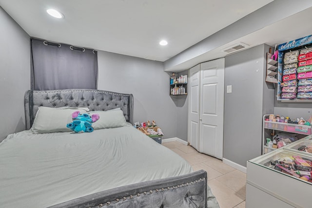 37 E Locust St, Central Islip, NY 11722 - bedroom with light tile patterned floors, baseboards, recessed lighting, and a closet