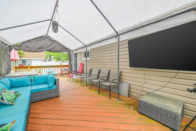 37 E Locust St, Central Islip, NY 11722 - wooden deck with an outdoor living space