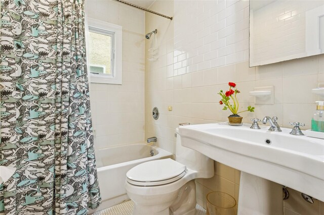 931A Oceanfront St, Long Beach, NY 11561 - full bathroom featuring shower / tub combo and tile walls