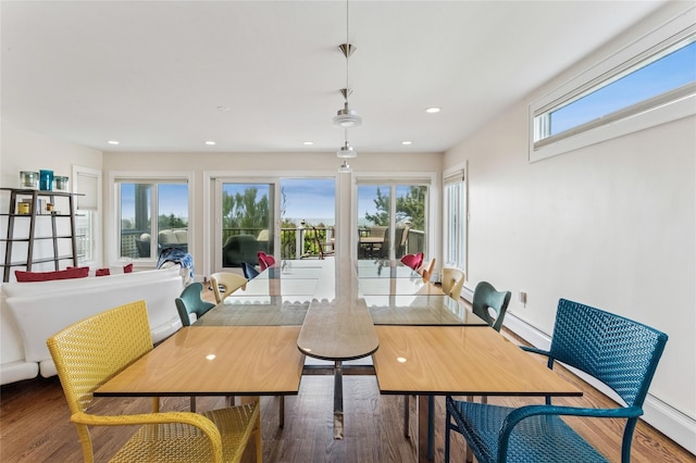 931A Oceanfront St, Long Beach, NY 11561 - dining area featuring wood finished floors, recessed lighting, and baseboard heating