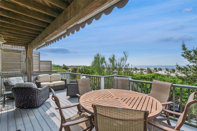 931A Oceanfront St, Long Beach, NY 11561 - deck featuring outdoor dining area, an outdoor hangout area, and a water view