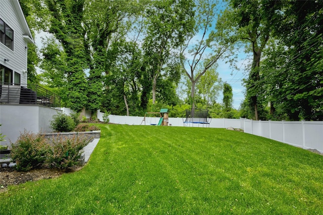 9 Wyndham Way, Port Washington, NY 11050 - view of yard featuring a playground and a trampoline
