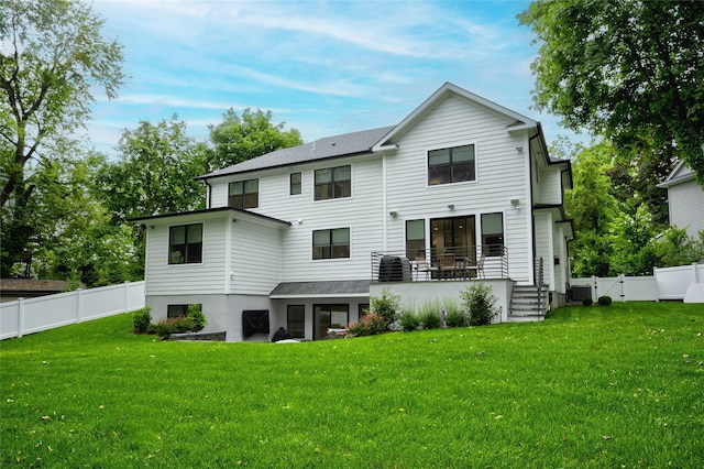 9 Wyndham Way, Port Washington, NY 11050 - back of house featuring cooling unit and a gate