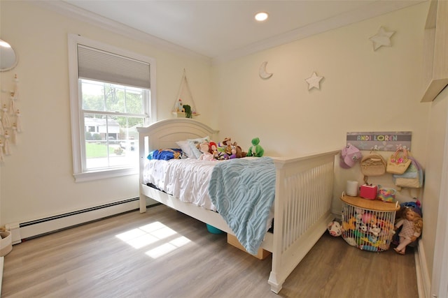 213 Glenwood Ln, Port Jefferson, NY 11777 - bedroom featuring a baseboard radiator, wood finished floors, ornamental molding, and recessed lighting