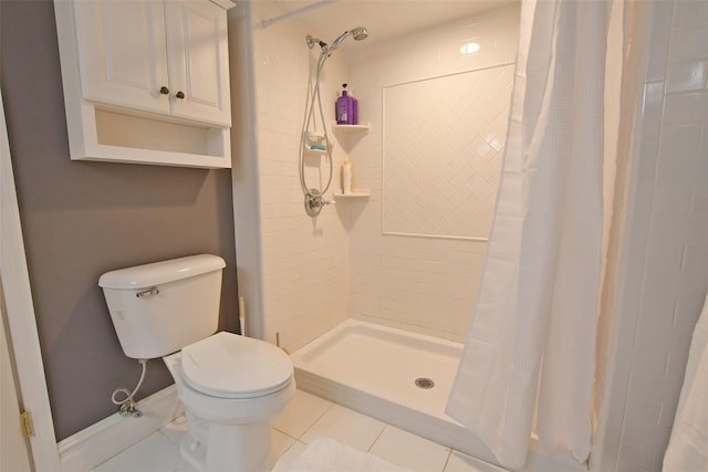 213 Glenwood Ln, Port Jefferson, NY 11777 - bathroom featuring toilet, a stall shower, and tile patterned flooring