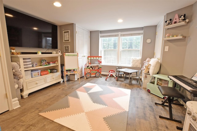 213 Glenwood Ln, Port Jefferson, NY 11777 - recreation room featuring wood finished floors and recessed lighting