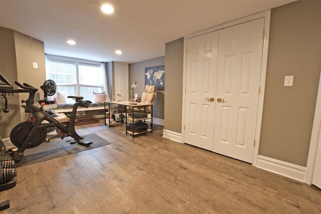 213 Glenwood Ln, Port Jefferson, NY 11777 - exercise room featuring baseboards, wood finished floors, and recessed lighting