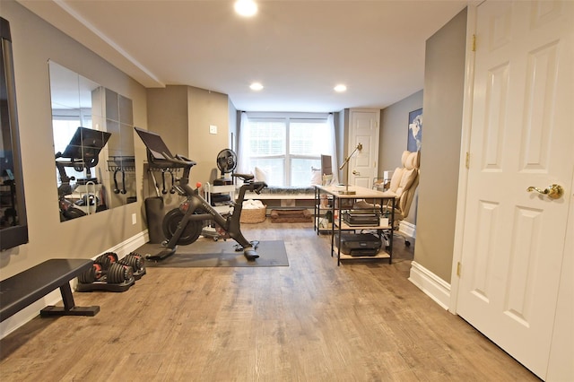 213 Glenwood Ln, Port Jefferson, NY 11777 - exercise area featuring wood finished floors, baseboards, and recessed lighting