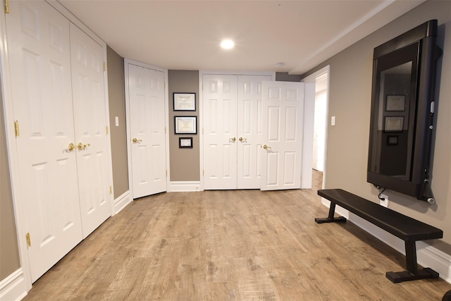213 Glenwood Ln, Port Jefferson, NY 11777 - entrance foyer featuring light wood-type flooring and baseboards