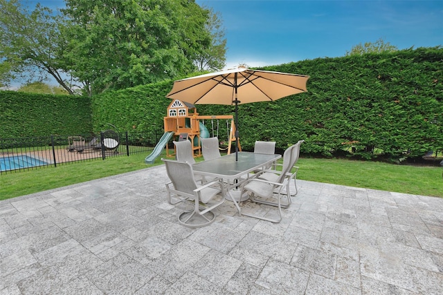 213 Glenwood Ln, Port Jefferson, NY 11777 - view of patio with outdoor dining space and a playground