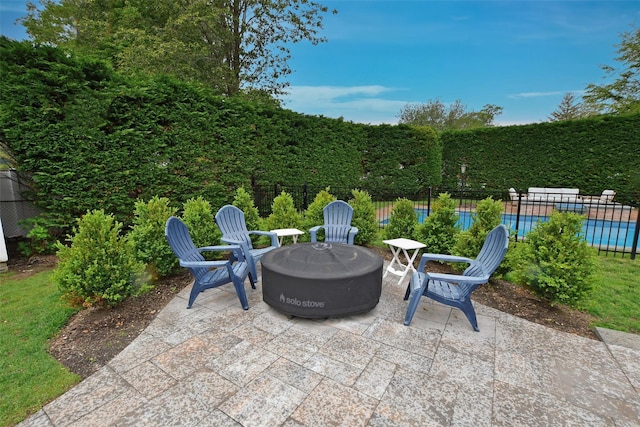 213 Glenwood Ln, Port Jefferson, NY 11777 - view of patio / terrace with an outdoor fire pit