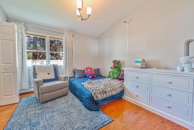 943 Durham Rd, East Meadow, NY 11554 - bedroom with lofted ceiling, light wood-style floors, and baseboard heating