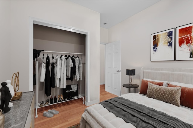 62 Buena Vista Rd, New City, NY 10956 - bedroom featuring wood finished floors and a closet